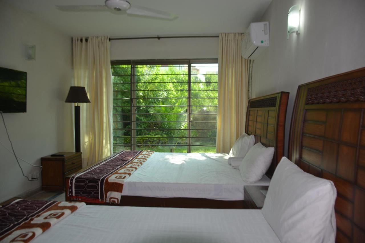 The Travelers Den Hotell Islamabad Exteriör bild