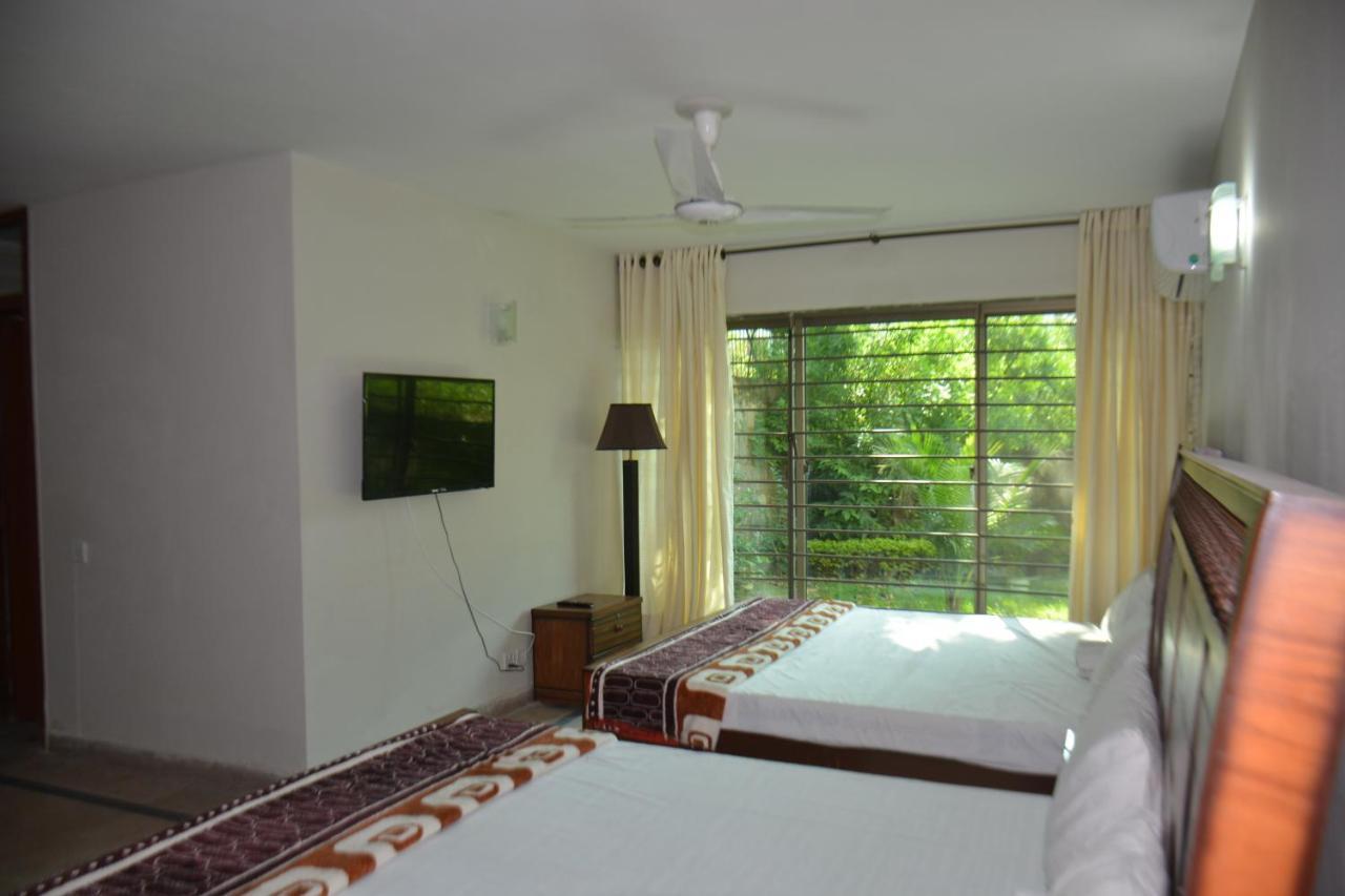The Travelers Den Hotell Islamabad Exteriör bild