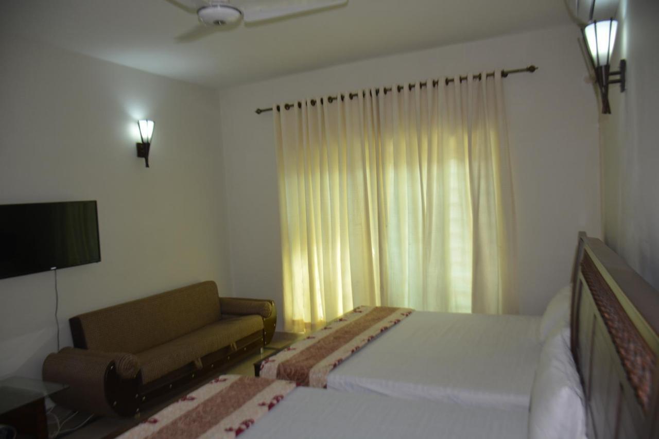 The Travelers Den Hotell Islamabad Exteriör bild