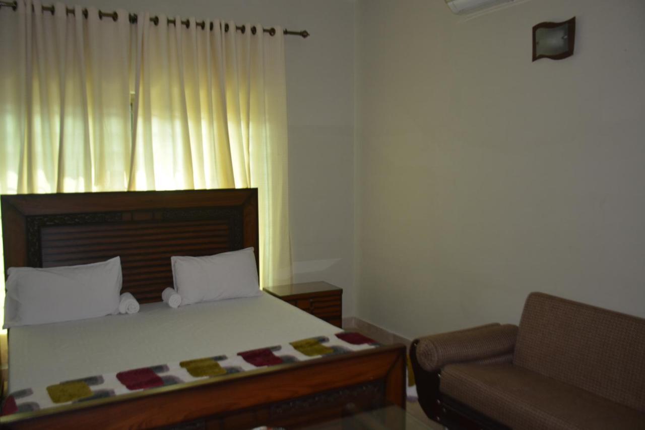 The Travelers Den Hotell Islamabad Exteriör bild